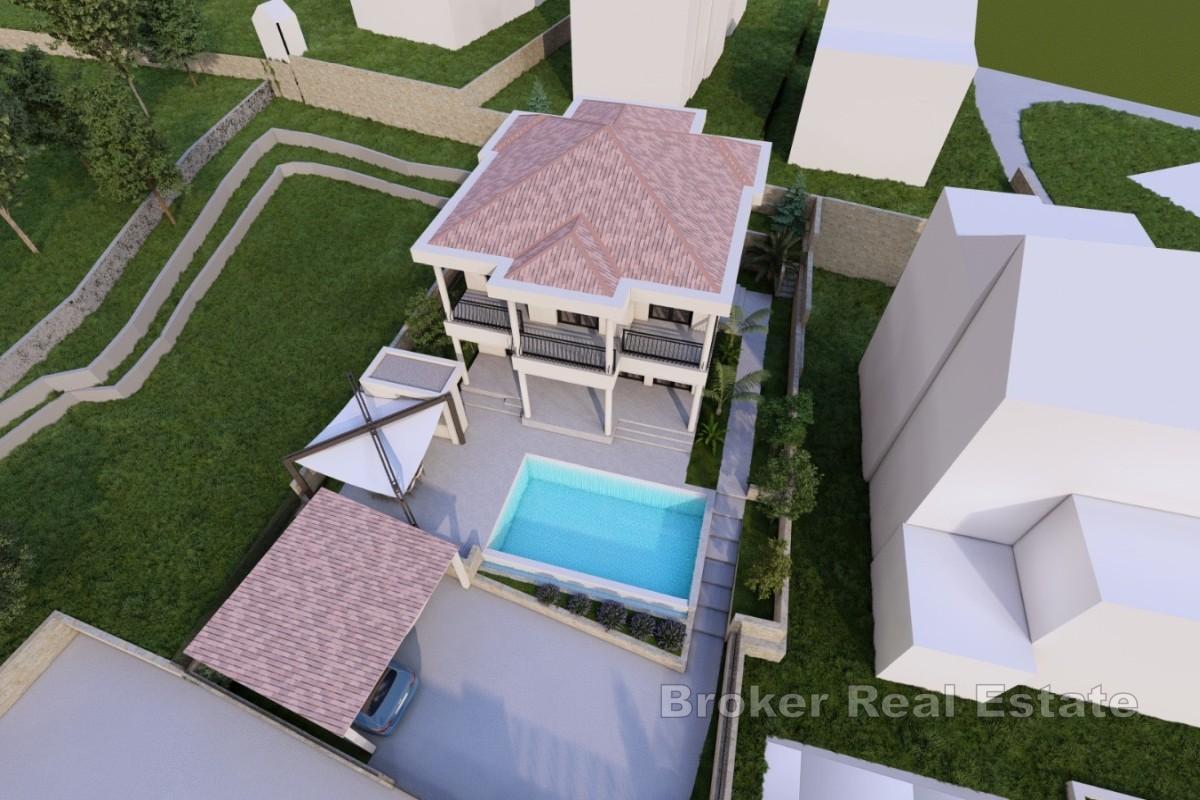 Terreno edificabile con permesso per una villa di lusso vicino al mare