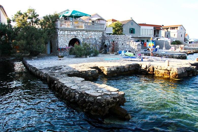 Maison / Villa première rangée de la mer avec sa propre plage