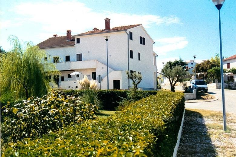 Maison mitoyenne, située dans un quartier calme, à vendre
