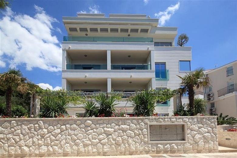 Belle penthouse, première rangée à la mer