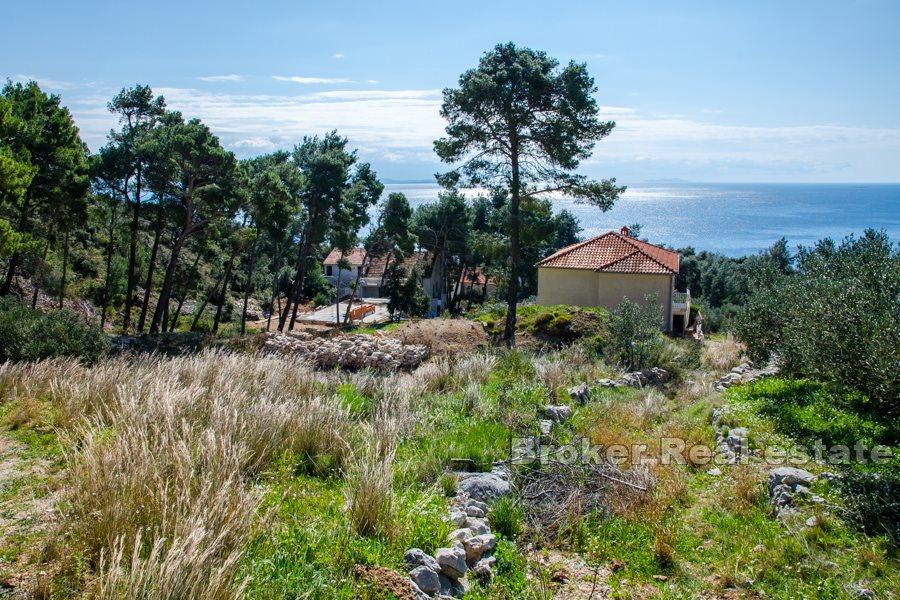 Bygningsland med havutsikt