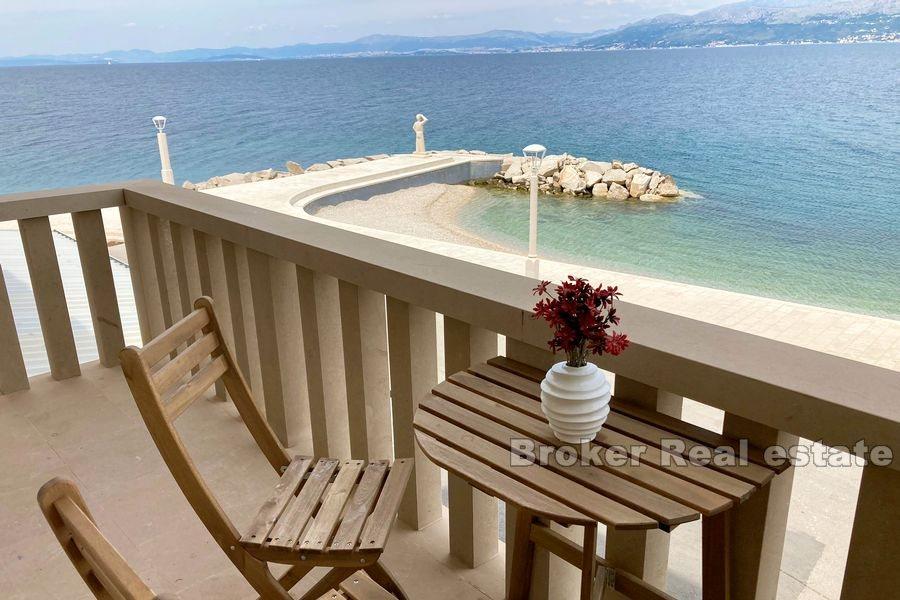 Appartement première rangée de la mer