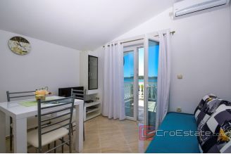 012 2029 36 near sibenik apartment house first row to the sea for sale