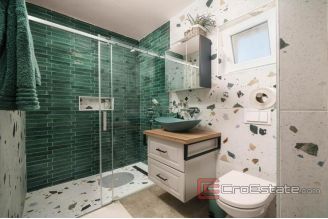 008 2021 355 near Sibenik stone house first row to the sea for sale