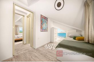 008 2021 355 near Sibenik stone house first row to the sea for sale