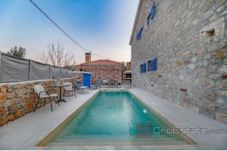 020 2018 243 Pasman stone house with pool with pool first row to the sea for sale
