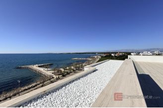 015 2043 167 Nin Exclusive apartment with pool first row to the sea for sale