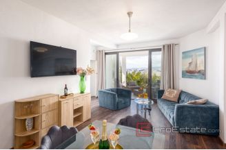 017 2048 44 Split area Modern apartment with pool and a sea view for sale