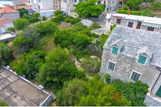 004 2041 107 Brac Stone house in the first row to the sea for sale