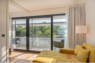 001 2046 102 Split Center Two modern apartment units for sale