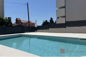 018 2035 243 Trogir Moder apartment in a new building with a sea view for sale