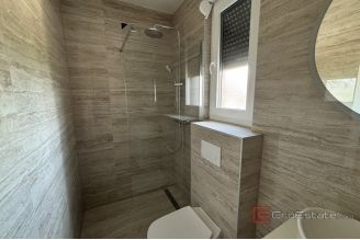 018 2035 243 Trogir Moder apartment in a new building with a sea view for sale