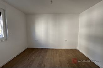 018 2035 243 Trogir Moder apartment in a new building with a sea view for sale