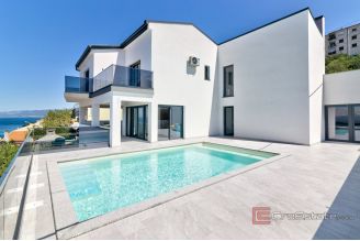 016 5426 30 Senj Modern villa with pool and an open sea view for sale