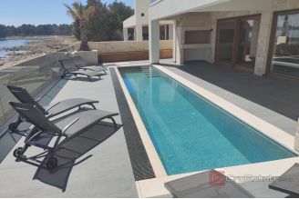 015 5485 30 Vir Villa with pool first row to the sea for sale