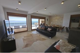 015 5485 30 Vir Villa with pool first row to the sea for sale