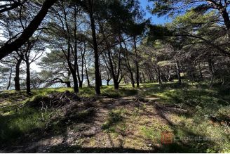 008 2052 119 Makarska Building land in the first row to the sea for sale