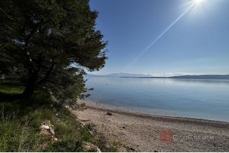 008 2052 119 Makarska Building land in the first row to the sea for sale