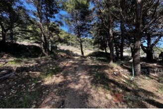 008 2052 119 Makarska Building land in the first row to the sea for sale