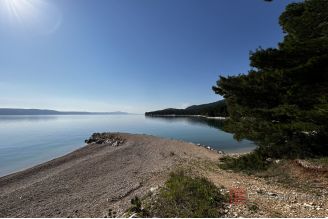 008 2052 119 Makarska Building land in the first row to the sea for sale