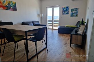 001 5503 30 Omis Four residential units in a smaller building for sale
