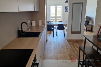 015 5503 30 Omis Four residential units in a smaller building for sale