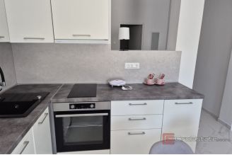 015 5503 30 Omis Four residential units in a smaller building for sale