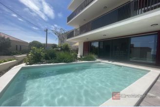 001 2035 370 Trogir modern two bedroom apartment with pool and sea view for sale