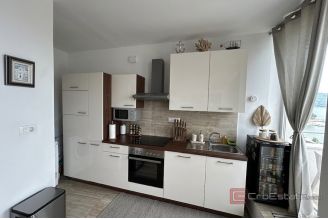 011 2052 124 Split Gripe Three bedroom apartment with a sea view for sale